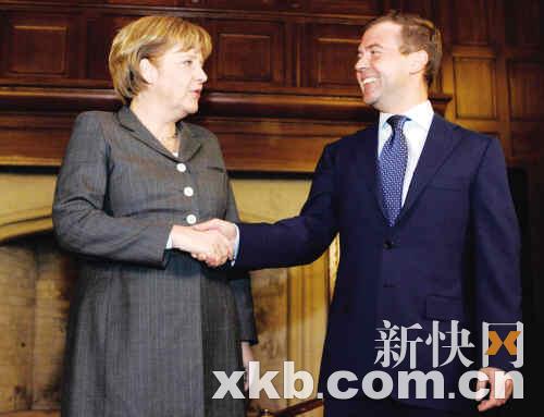 普京会见默克尔